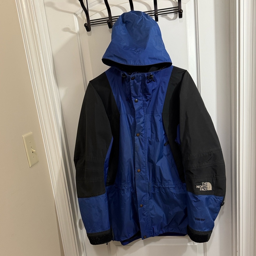 The North Face Blue and Black Kids' Hooded Rain Jacket